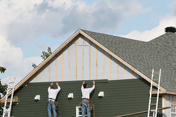 Professional Storm Damage Siding Repair technician working in Warsaw, NC
